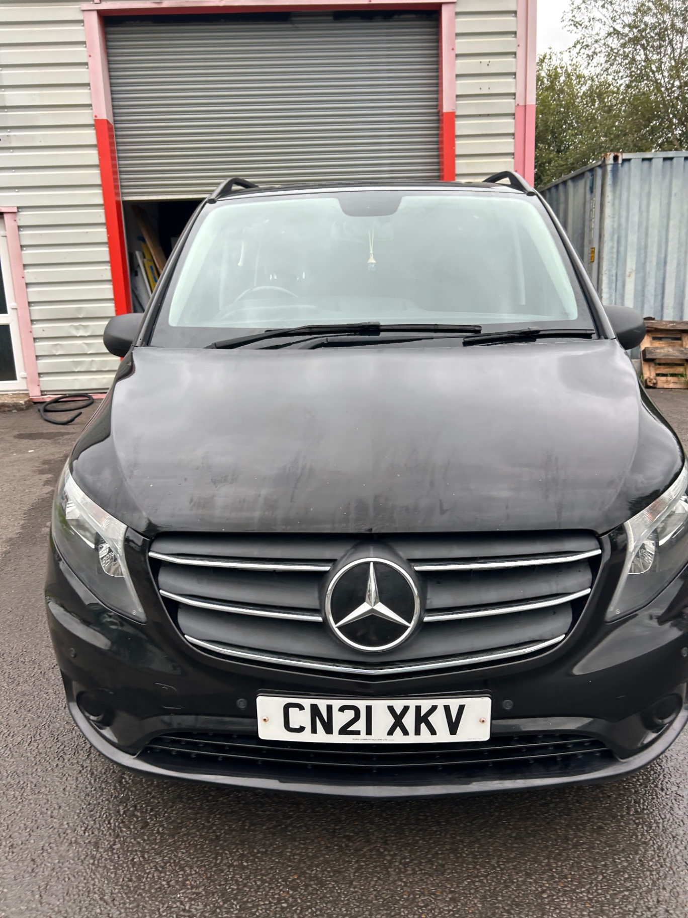 Front view of a black Mercedes Vito after detailing by PressureWashPyle